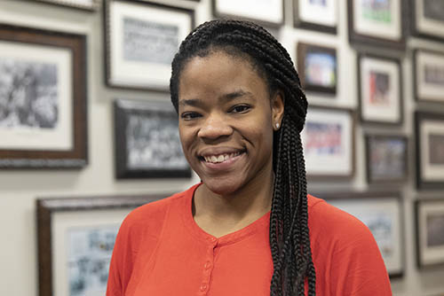 a professional headshot of Ke-La Harris smiling at the viewer