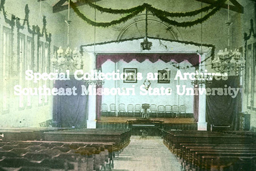 Photo from the 1880s of the Normal School Auditorium, colorized.