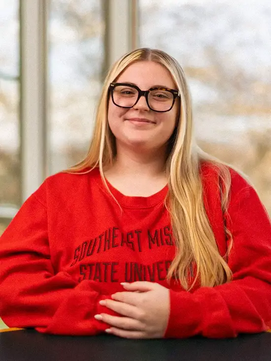 Alexis, a management major at SEMO, smiles as she shares about management degree ROI.