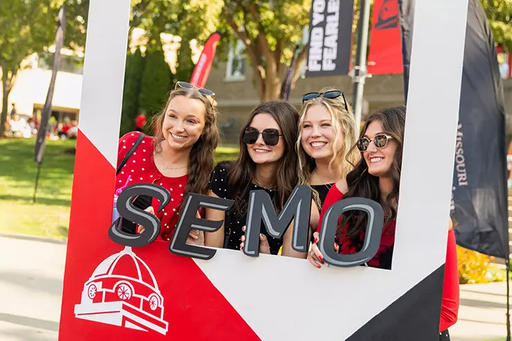 a group of semo students pose for a photo op, enjoying the campus life at southeast missouri state university