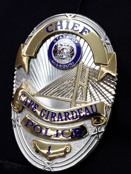 close up view of a cape girardeau police uniform badge