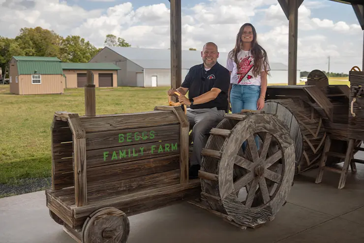 President Brad Hodson and a student at their home town near SEMO