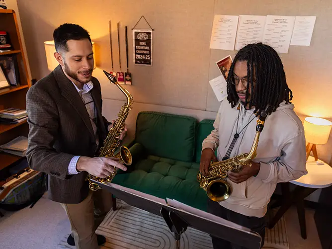 Music instructor, Michael Chapa, leads a student in one-on-one saxophone instruction at SEMO, a top music school in Missouri. 