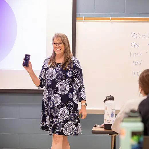 Dr. Fulton, a communication disorders professor, leads class discussion in a classroom in our Graul building. 