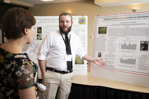 A SEMO student presents their research project at the Student Research Conference.