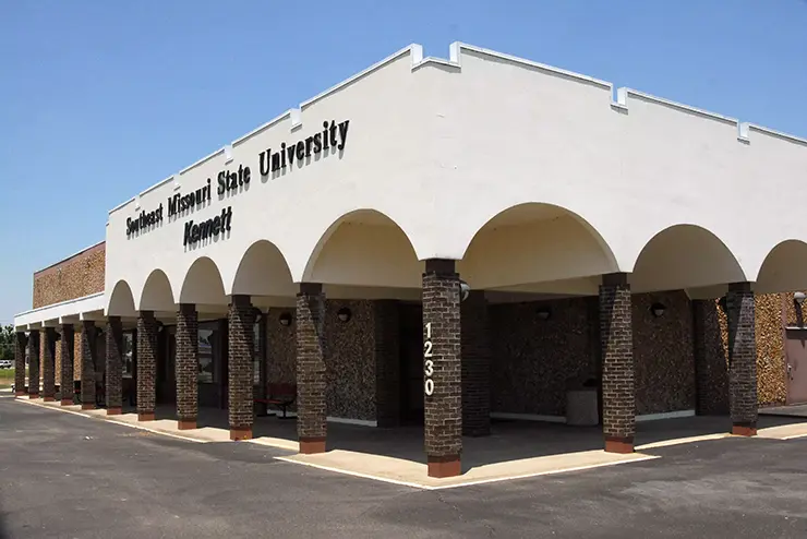 an exterior view of the Kennett Campus building on a sunny day
