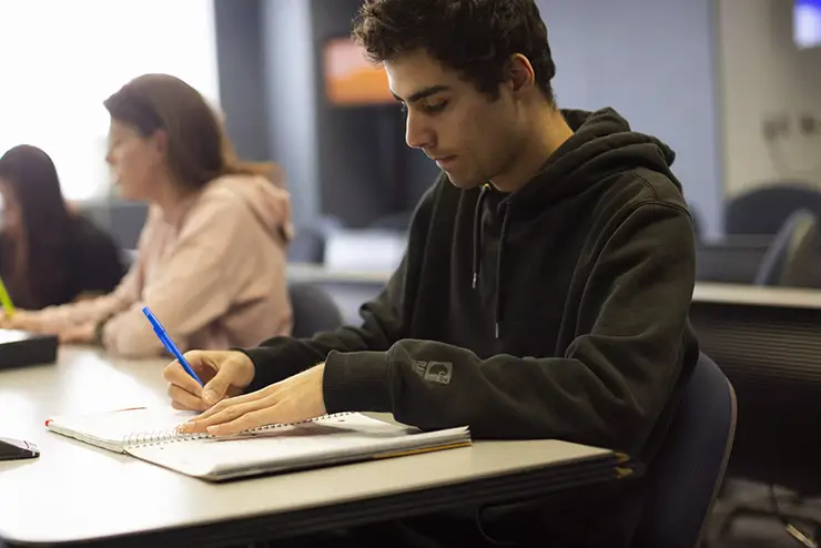 a SEMO sikeston regional campus student takes notes