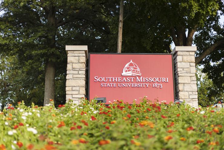 Flowers near a Southeast Missouri State University sign.