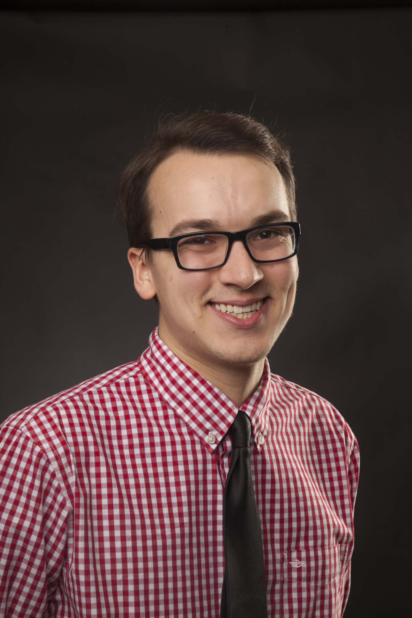Brady Nahlik smiles for a portrait.