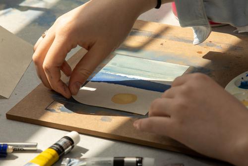 An art degree student paints art on March 4, 2021, at Southeast Missouri State University in Cape Girardeau, Missouri. 