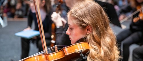 music performance instrumental major focuses on her violin and plays in the symphony band performance at SEMO