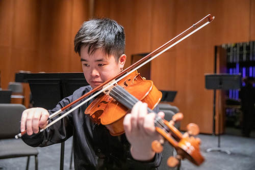 music performance instrumental major plays the violin during a performance