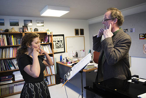a bachelor of music instructor teaches a vocal performance major