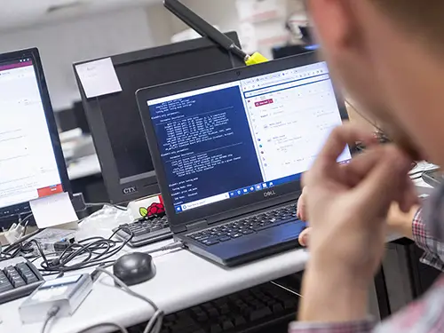 a SEMO network security student works on a project in class