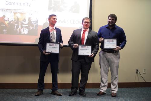 Three students hold their awards after participating in the Center for Innovation and Entrepreneurship’s SEMO Pitch Challenge.