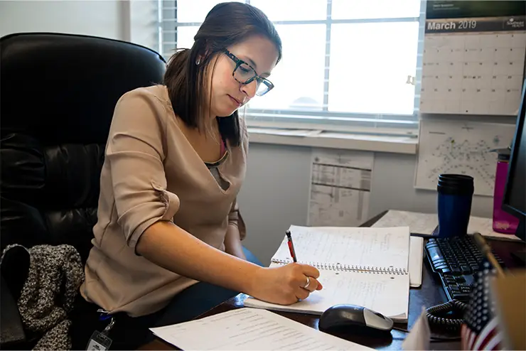 Criminal Justice and Social Work student at an internship working before starting their career. 