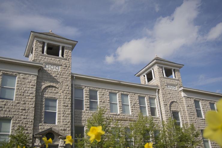 Flowers bloom in spring around A.S.J. Carnahan Hall where many Political Science degree courses are taught. 