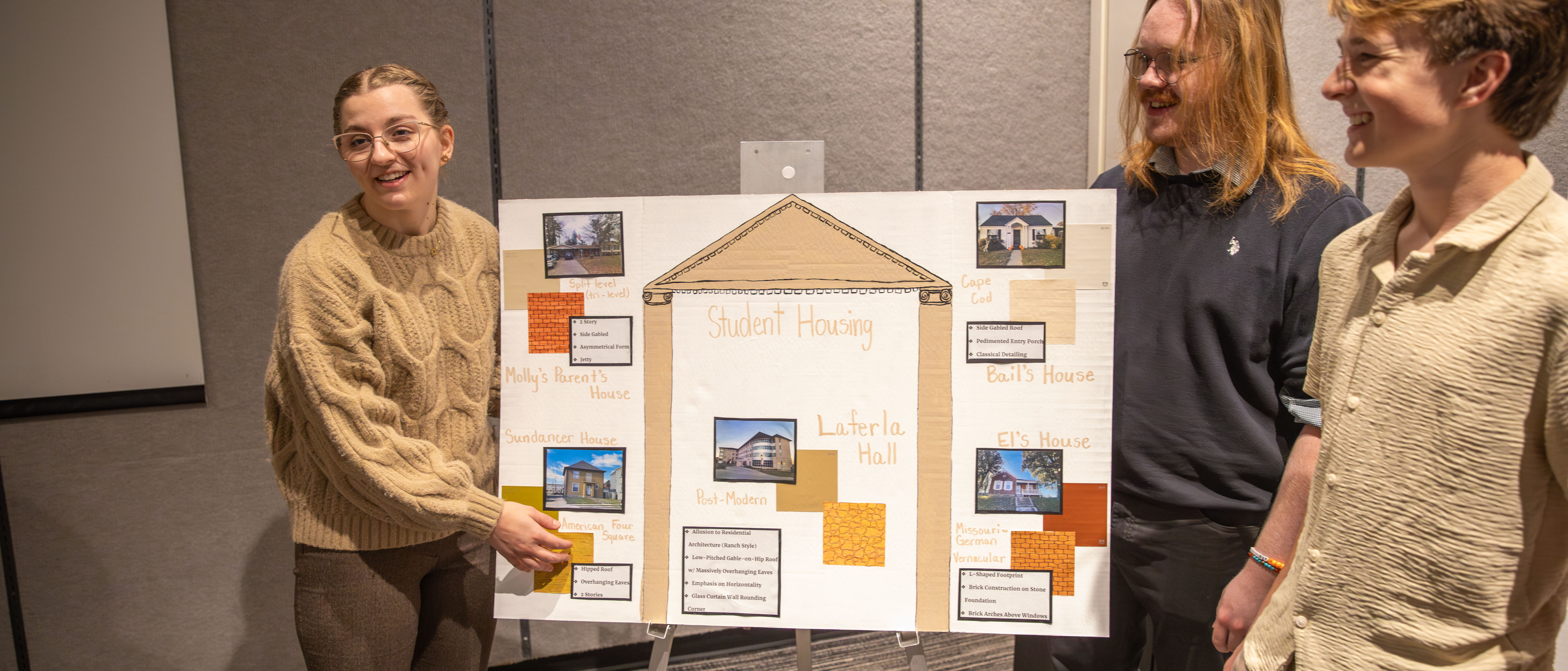 Three history major program students present about Laferla Hall.