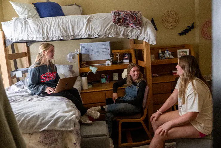 Students living on campus and talking in their dorm at SEMO 