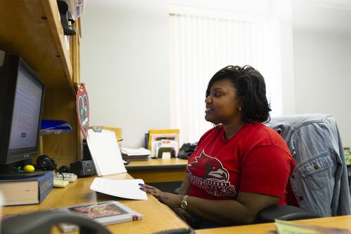 Women working on a computer for online class