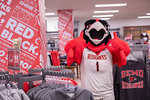 Rowdy poses in the SEMO bookstore.