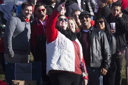 A group of family and friends take a selfie during the Homecoming parade.