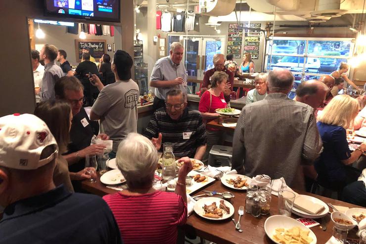 A group of SEMO alumni meet for an event.  