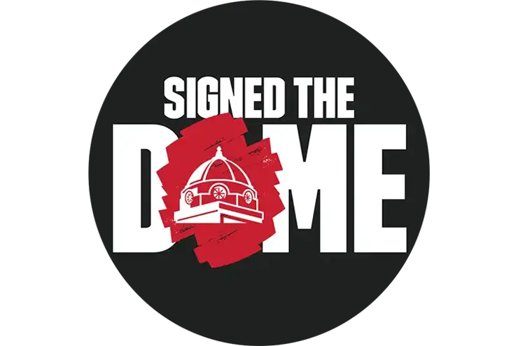 a button mock up with the words signed the dome