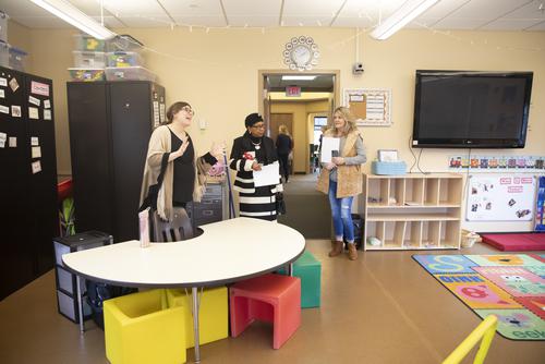 Dr. Loretta Prater and Center staff tour a therapy room at the Autism Center for Diagnosis and Treatment.