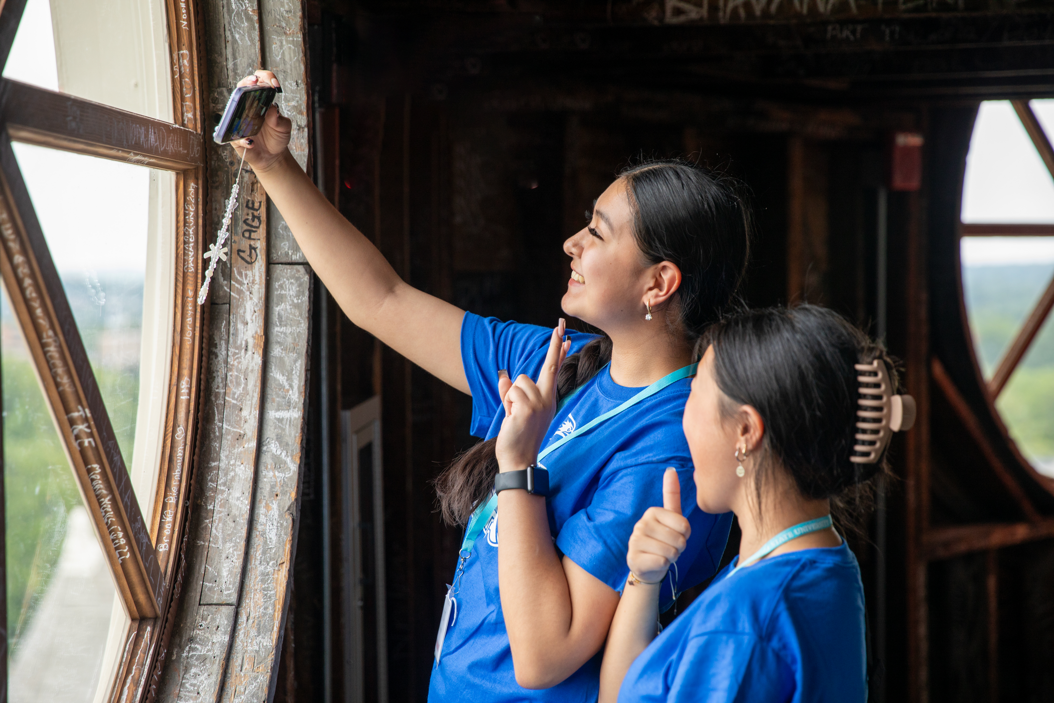 Two camp goers snapping a quick selfie while visiting the Dome during their time at Camp Redhawk. 
