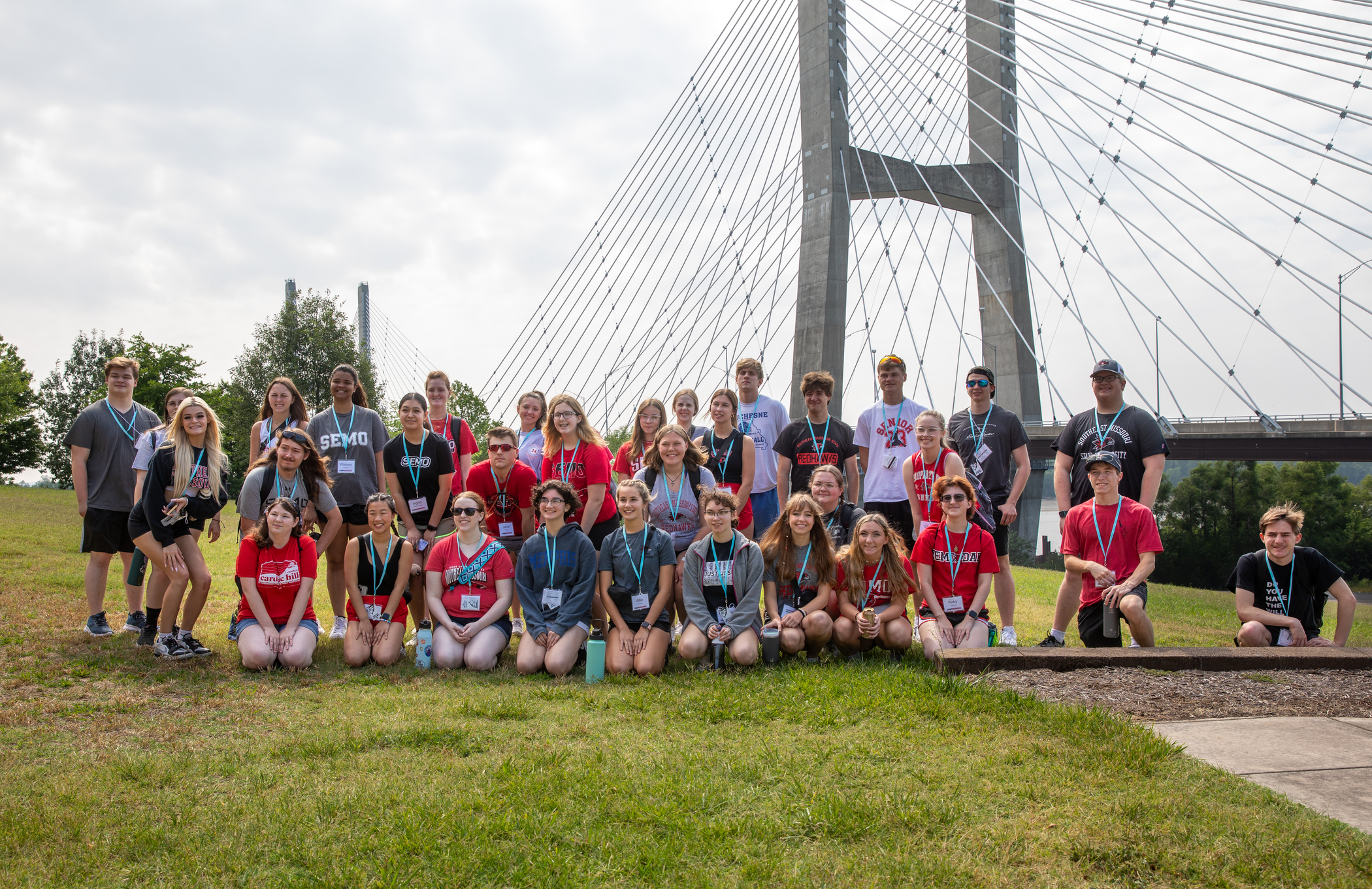 A group from a previous Camp Redhawk session poses in front of the Bill Emerson Memorial Bridge on our River Campus. 