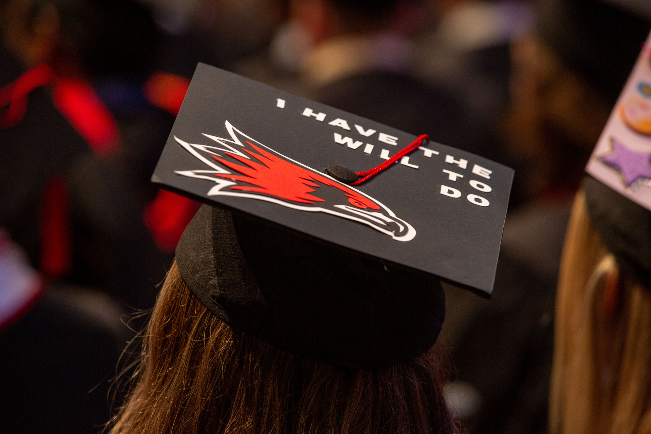 A graduation cap decorated with the SEMO spirit logo reading, "I have the Will To Do".