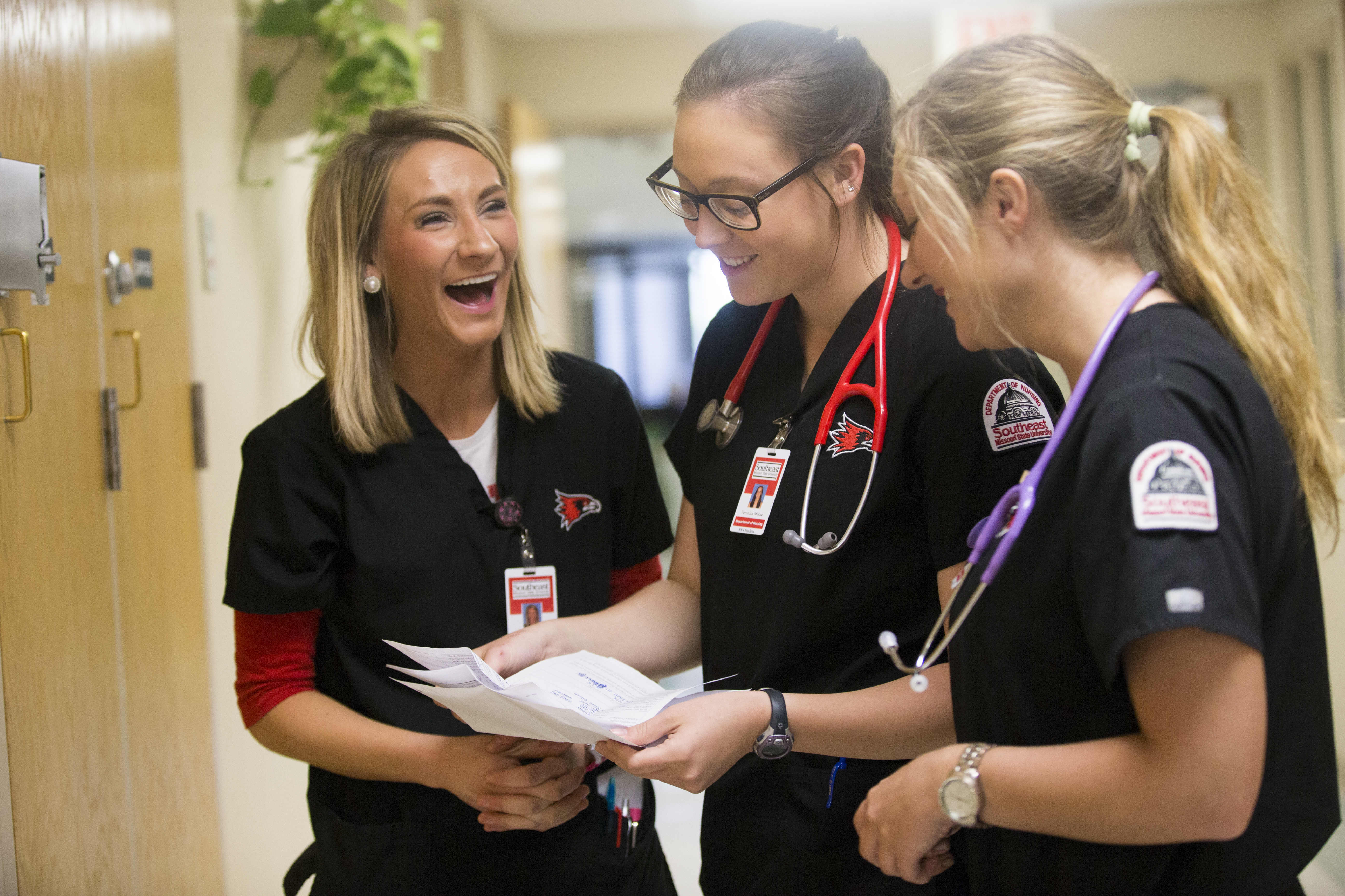Nursing students laughing together 