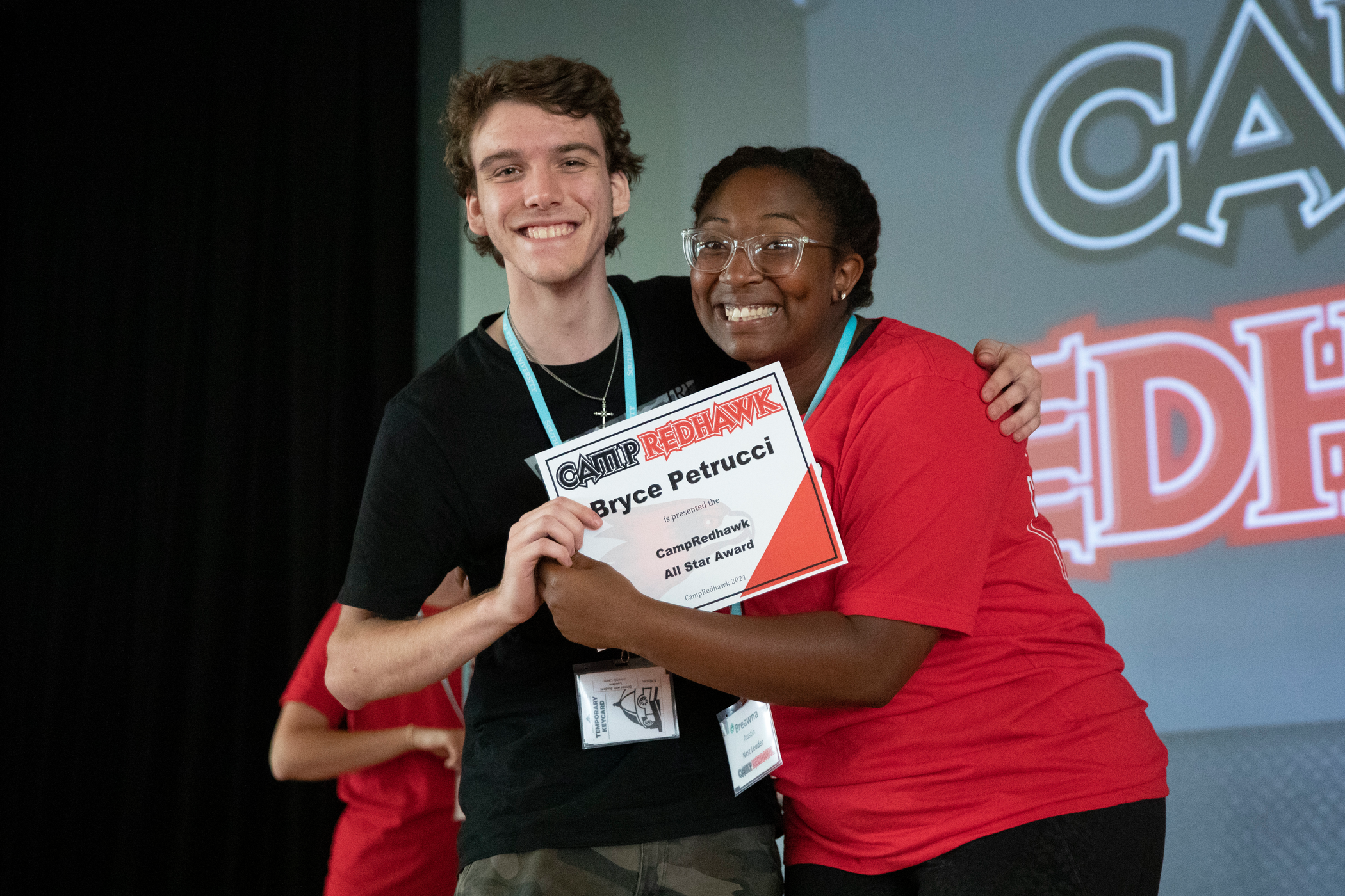 Camp goers receives the Camp Redhawk All Star Award at the closing ceremony.