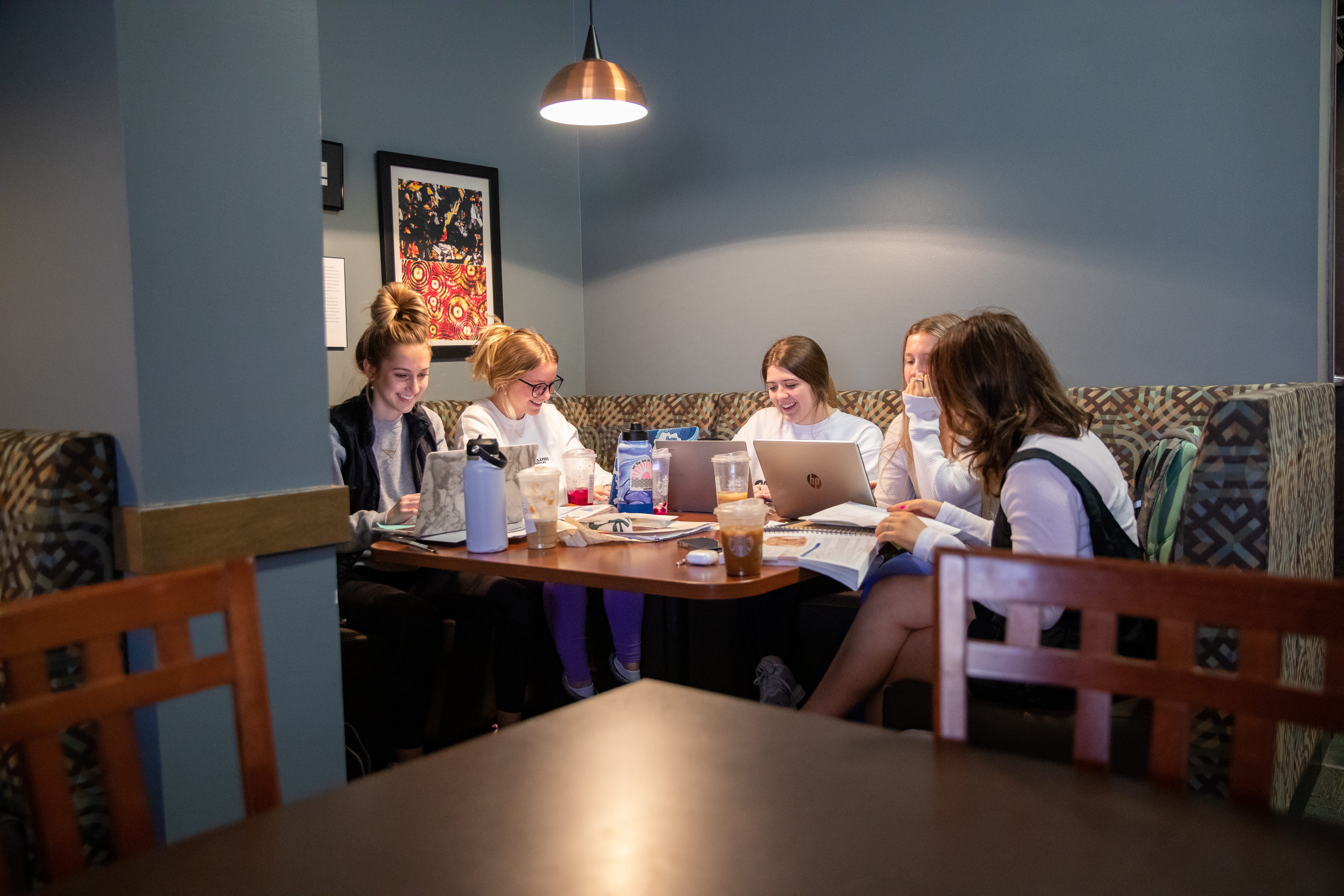 SEMO students studying around a table in Starbucks.
