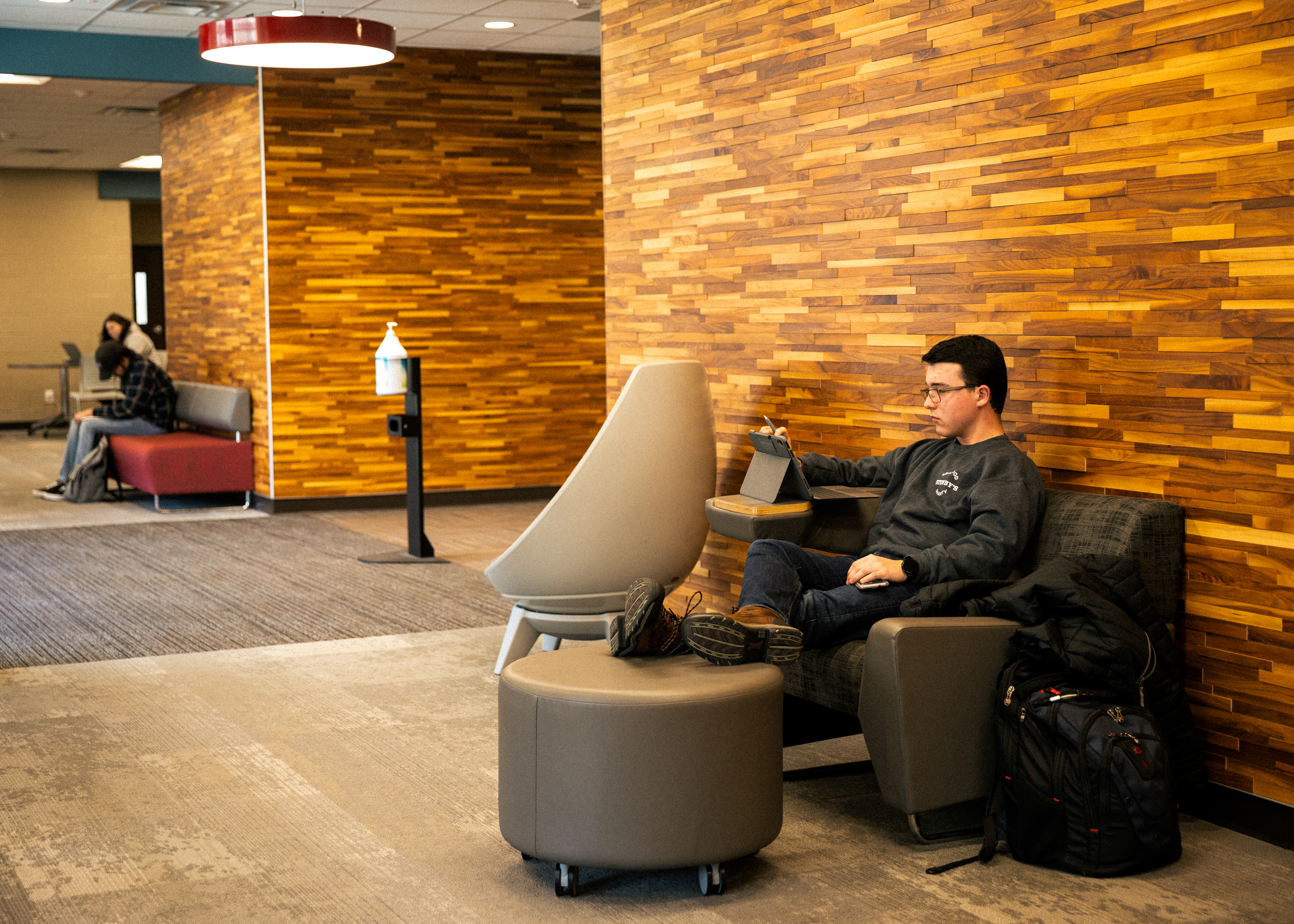 College student studying at the Grauel English Building Lounge at Southeast Missouri State University