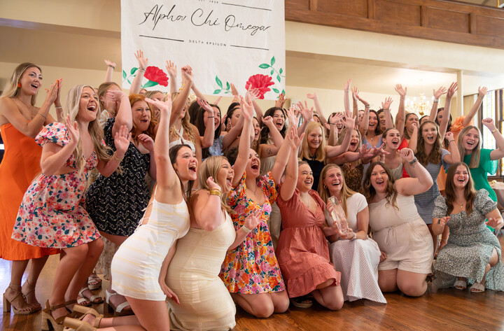 Sorority, Alpha Chi Omega celebrating winning chapter of the year.