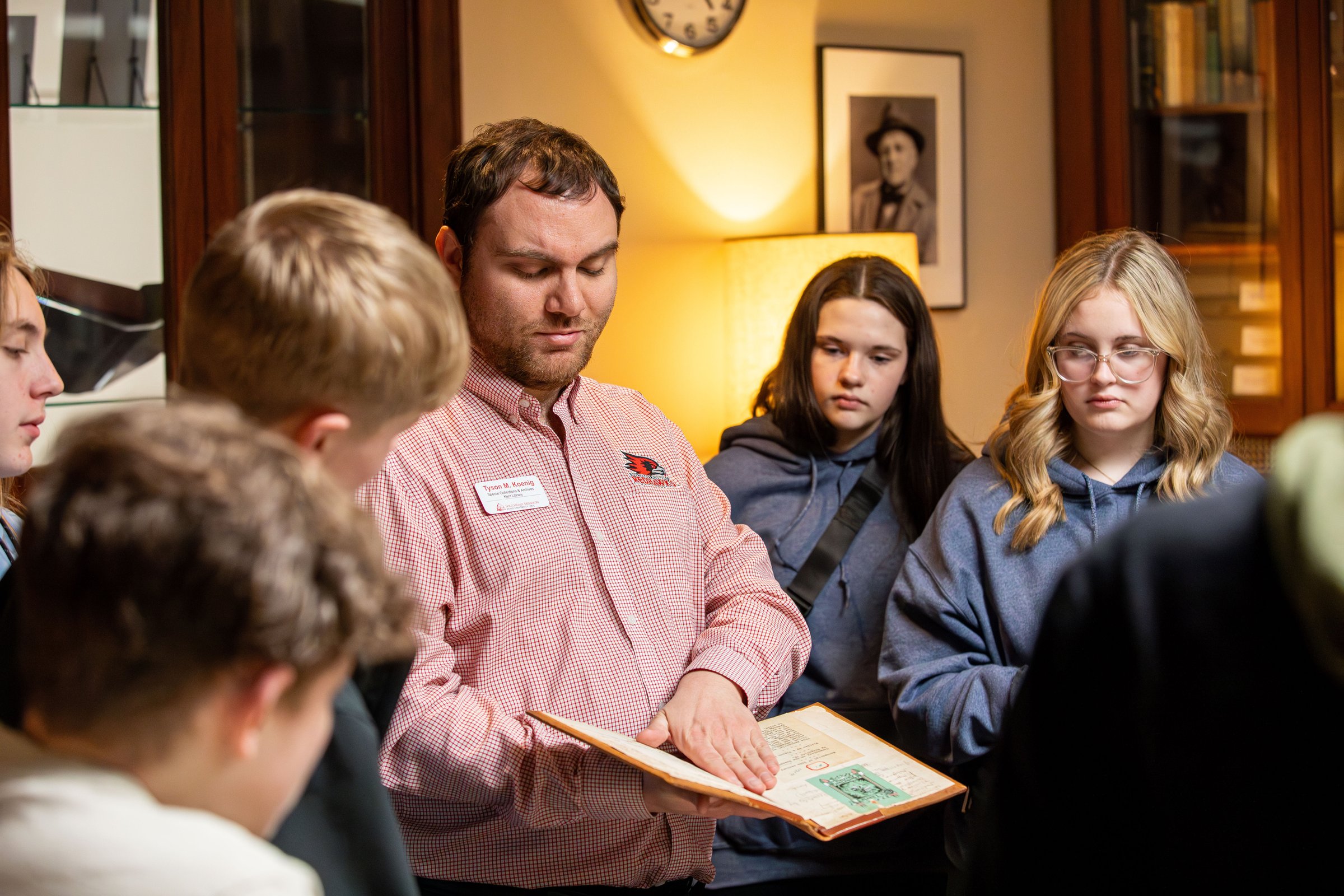 A semo historic preservation professor is lecturing his class in Kent Library's rare book room.