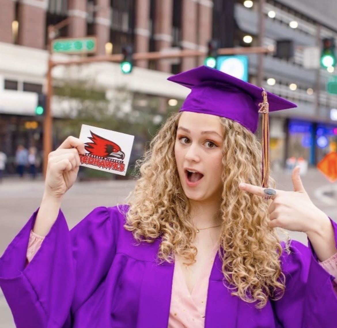 High school graduate accepting a college offer