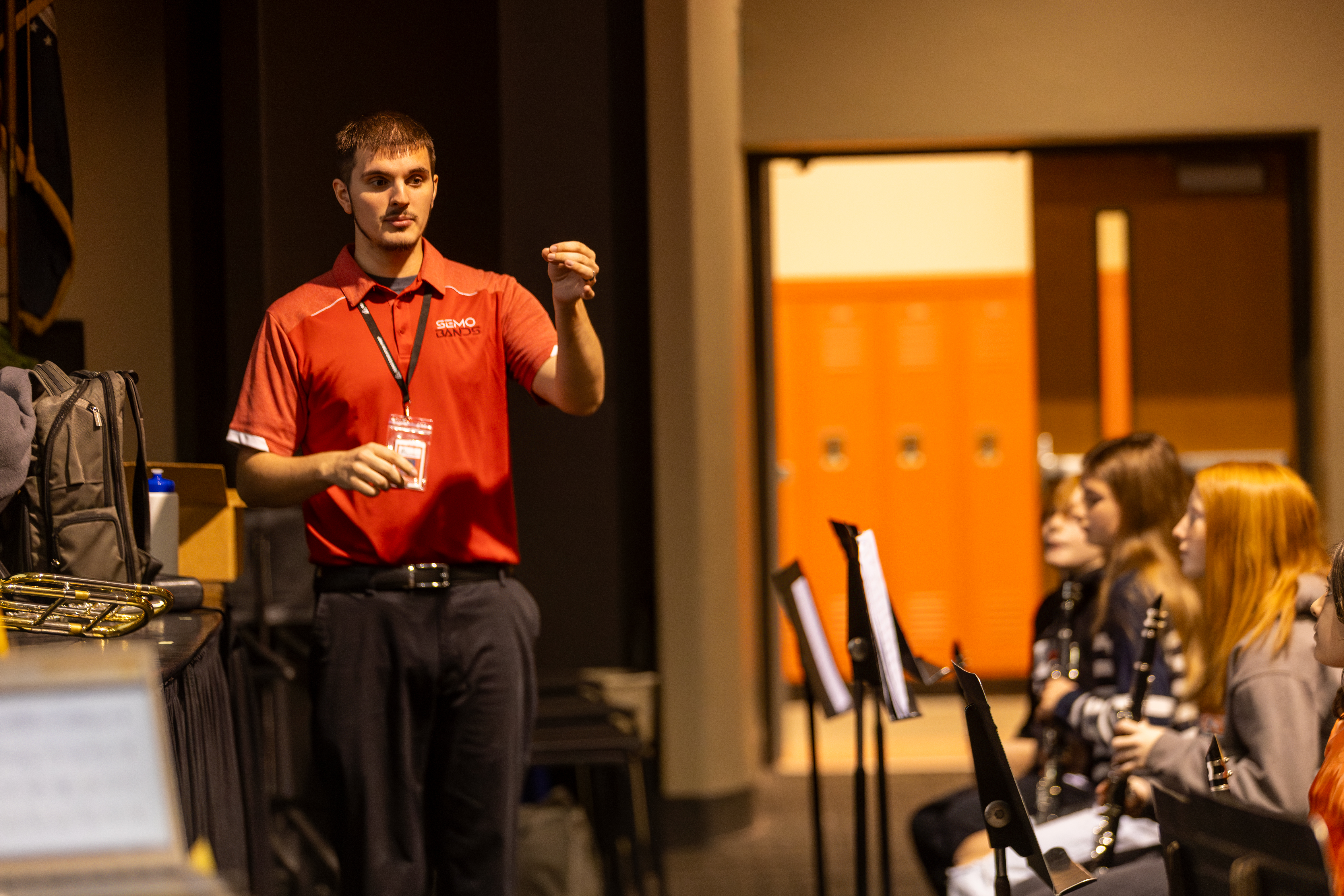 SEMO Music Education student teaching a band class at a school