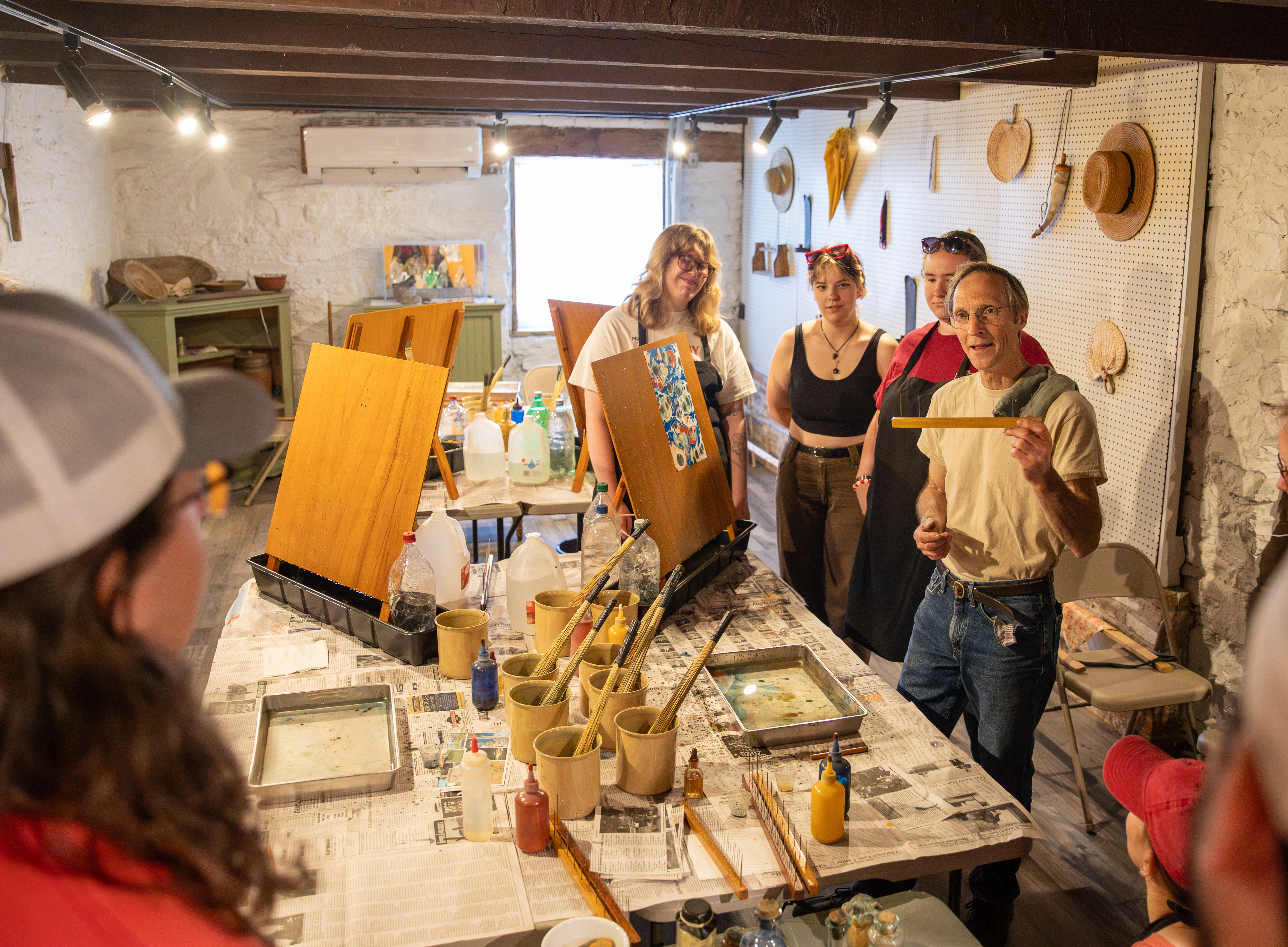Historic Preservation Field School Students listening to a lecture.