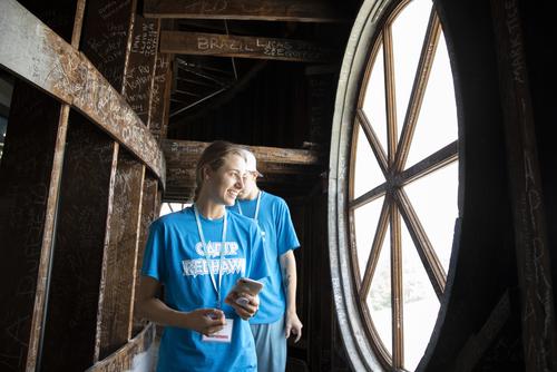 Students look through the window of Southeast's dome.