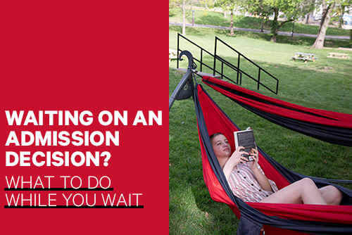 waiting on an admission decision? what to do while you wait. Young woman relaxing with a book in a red and black hammock.