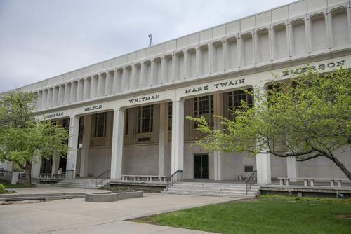 Front of Kent Library portico on a sunny day with leafy green trees