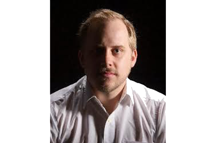 Headshot of Aleks Merilo.