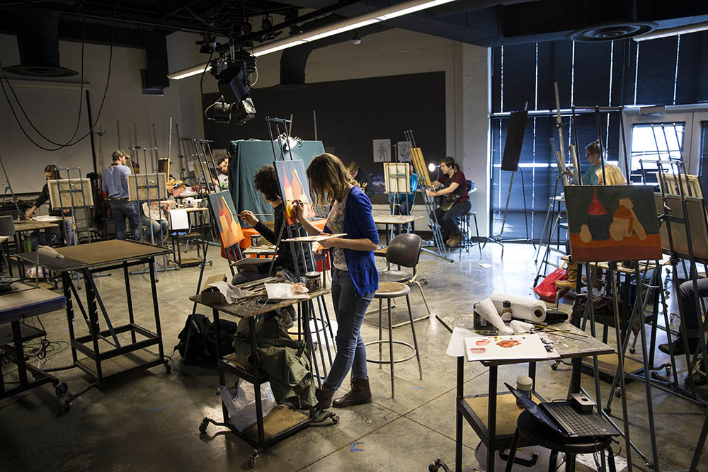 Art students paint at Southeast Missouri State University in Cape Girardeau, Missouri. 