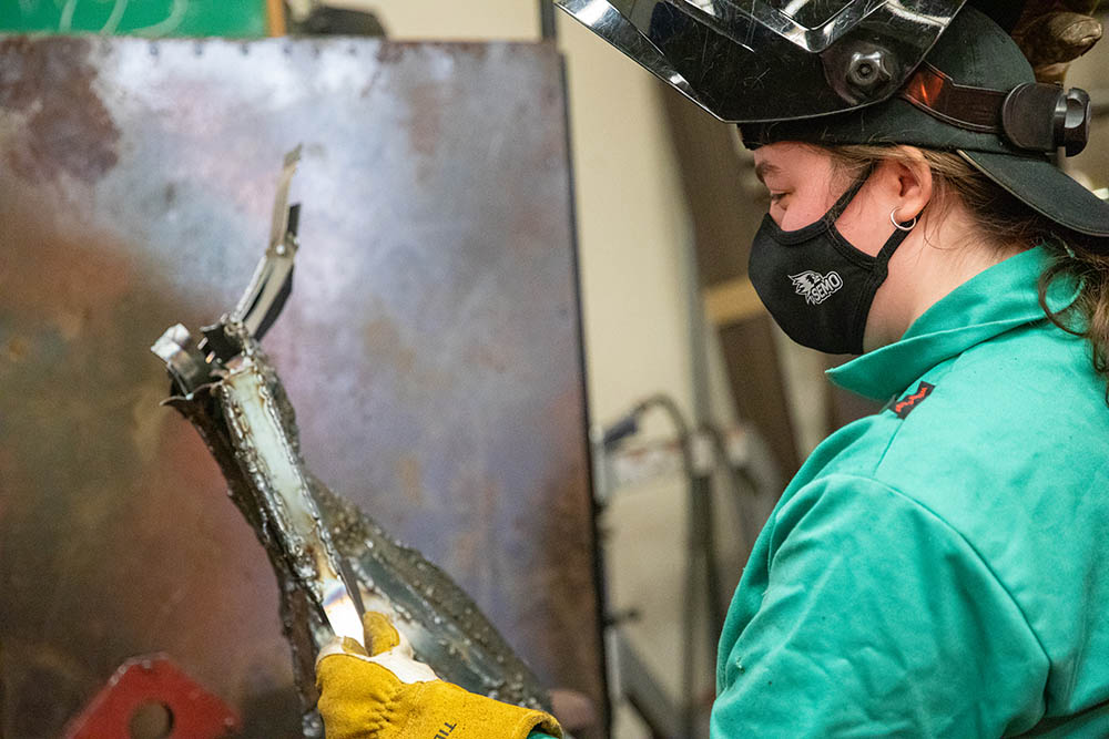 A sculpture student works with metal on March 4, 2021, at Southeast Missouri State University in Cape Girardeau, Missouri. 