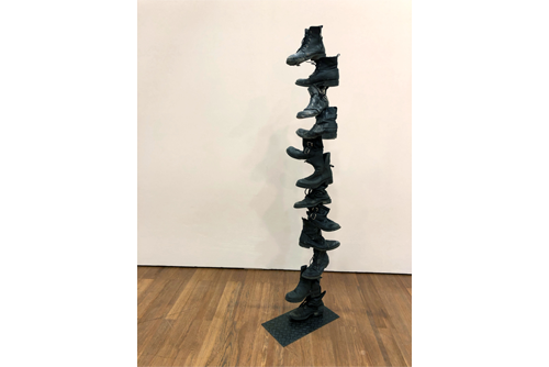 Artwork titled “Boots: a self portrait” by Erin Tucker. 