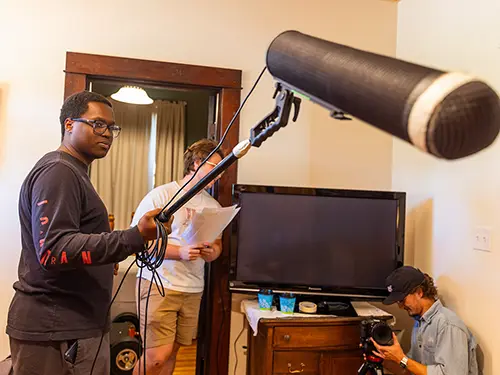 SEMO media students work together on a set as a part of experienital learning programs at SEMO in missouri