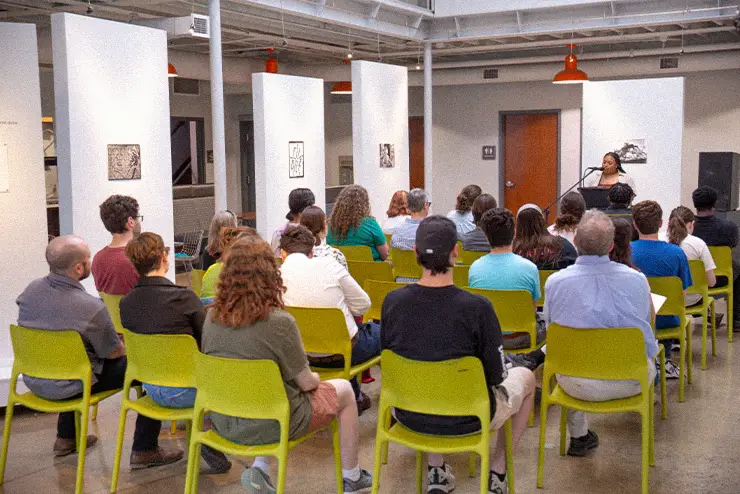 a group listening to a speaker in class as a part of experieintial learning program at SEMO for mass media art and design
